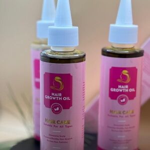 Pink Hair Care Essentials with White Dispensers